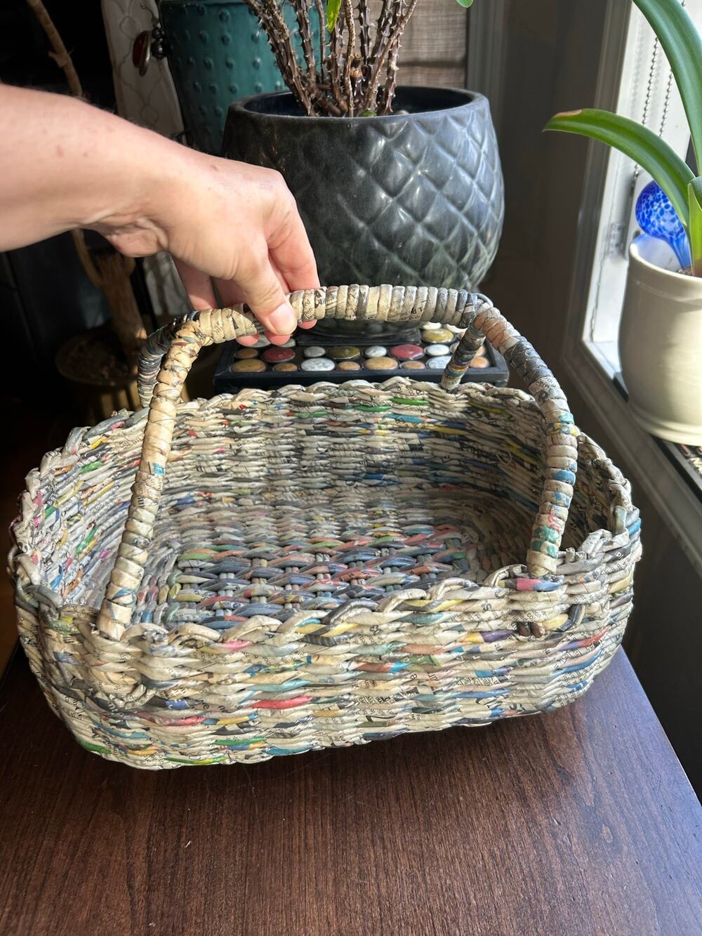 Handwoven Recycled Newspaper Basket crafted tightly rolled colorful strips